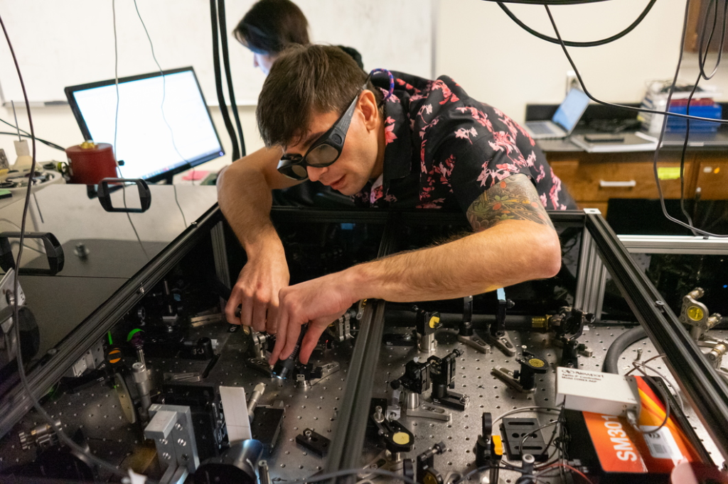Photo of student in a lab.