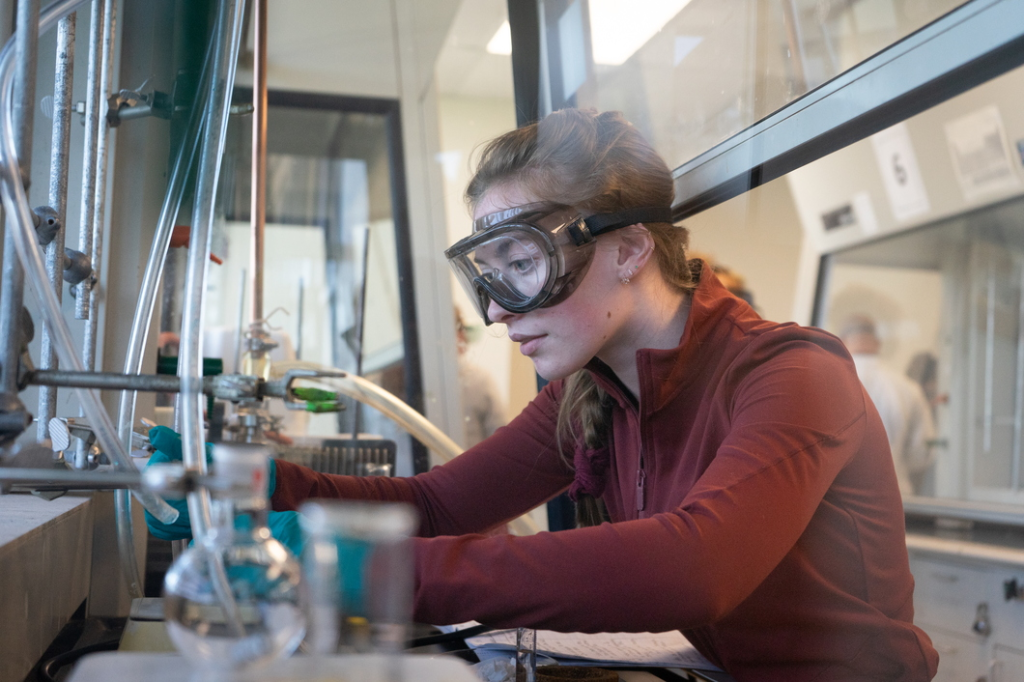 Photo of student in a lab.