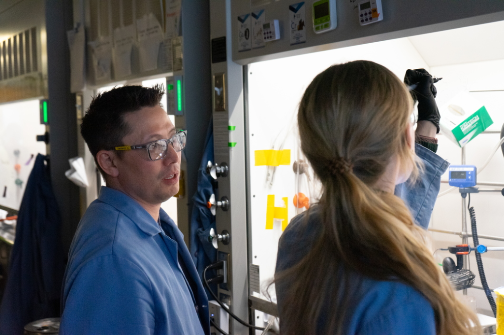 20240119163748-603850a8-me Photo of Professor Garret Miyake with student in lab.