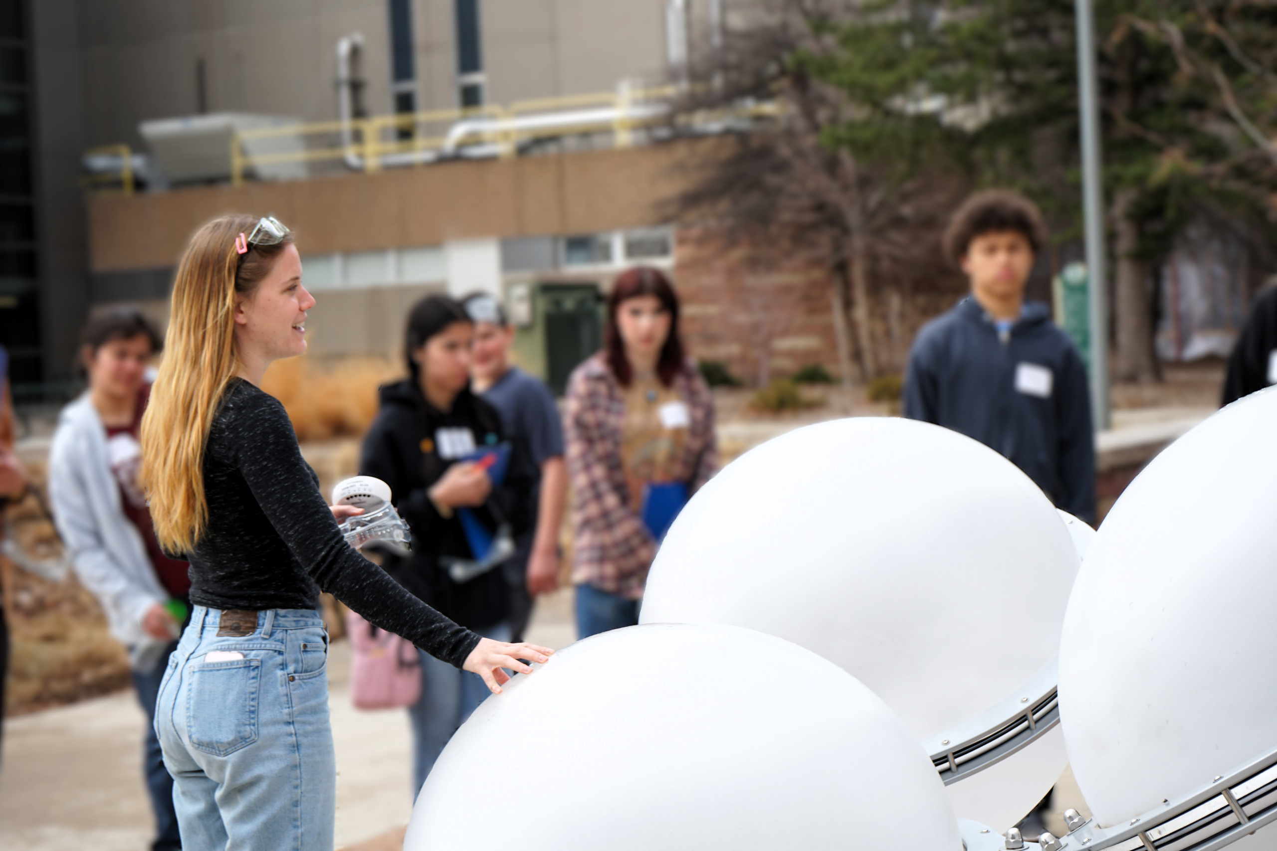 Photo of grad student giving a tour.